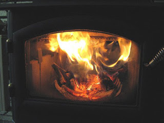 Tired of your old flame? Save up to $1,500 to upgrade your old wood burning stove/insert